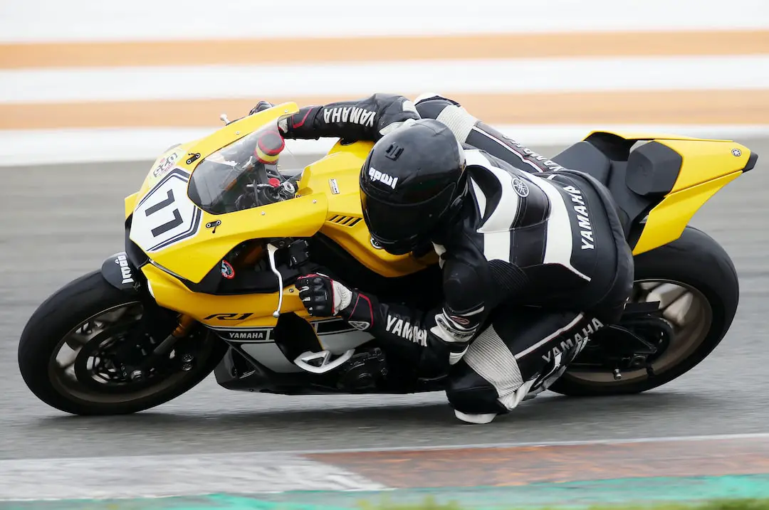 person riding a black sports bike
