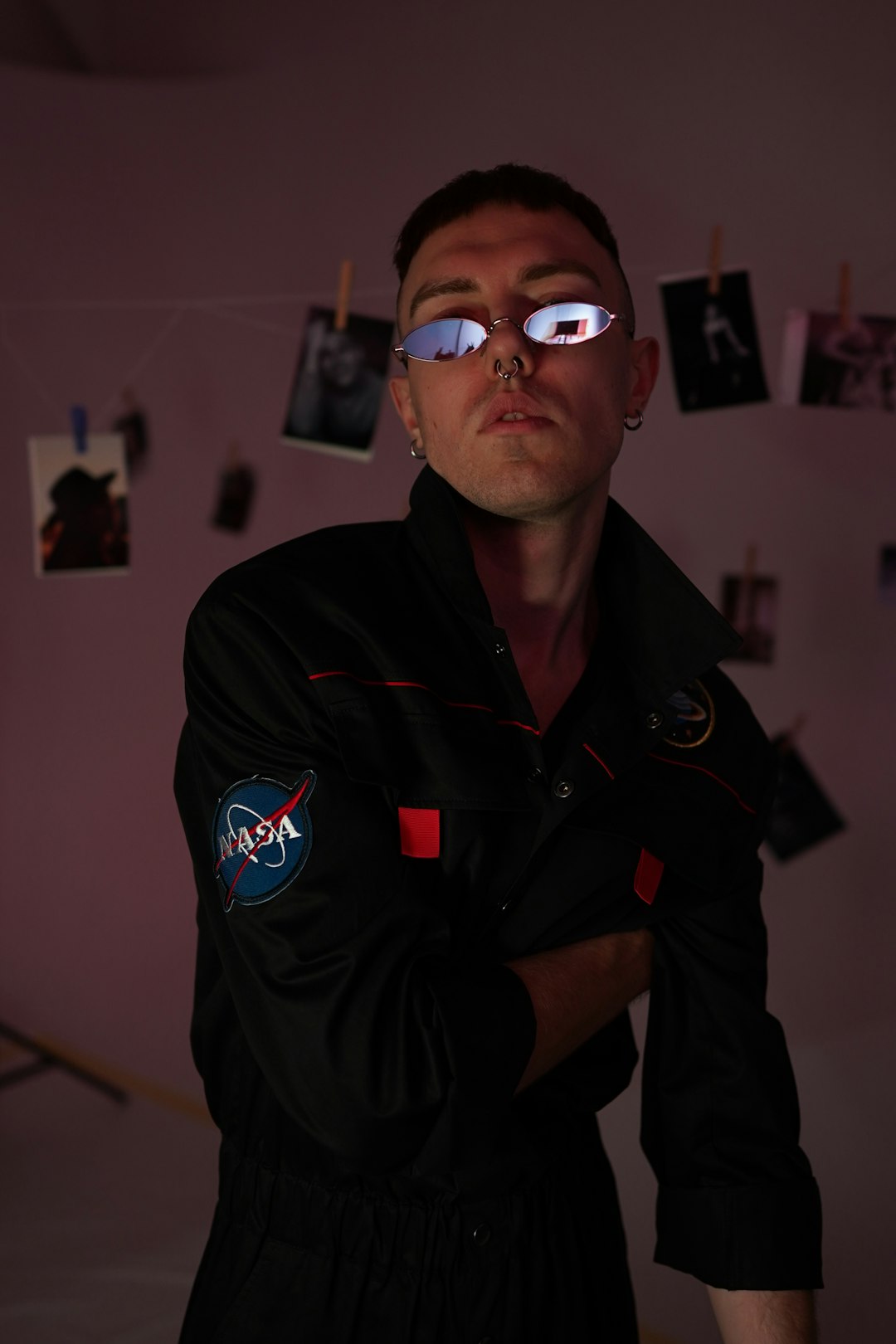 man in black jumpsuit standing inside room