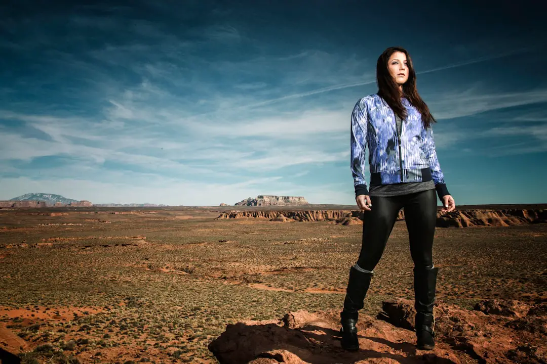 woman standing on brown soil